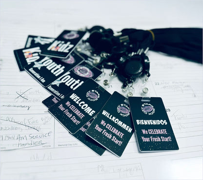 VIVID team badge — detail view showing print quality and badge finish