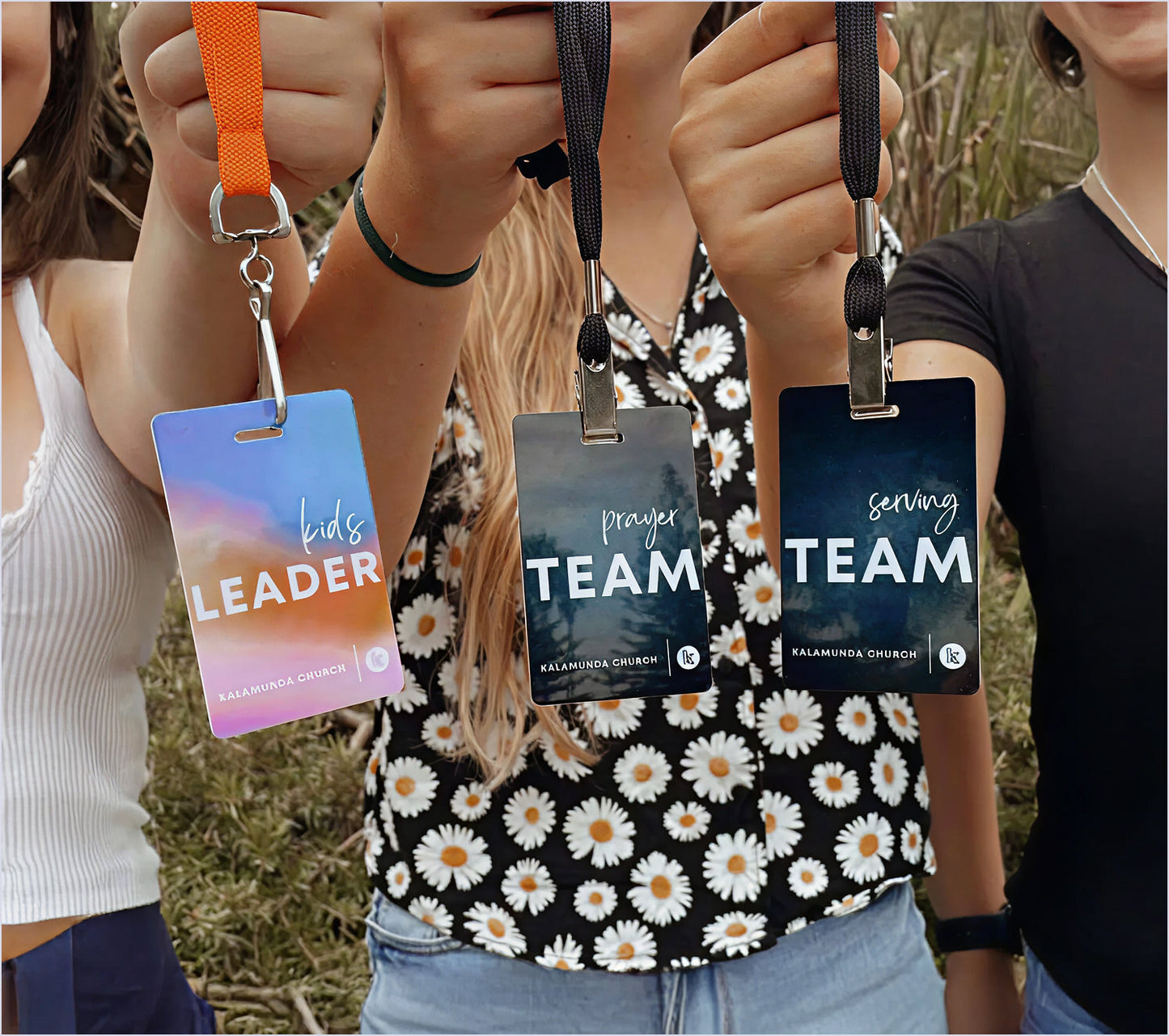 VIVID team badge — lifestyle view showing badge worn by church team member